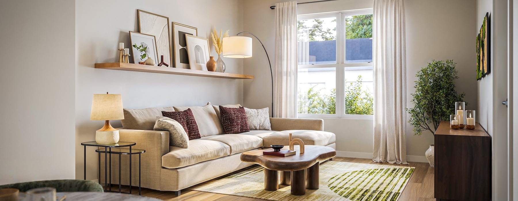 a living room with a couch and a lamp