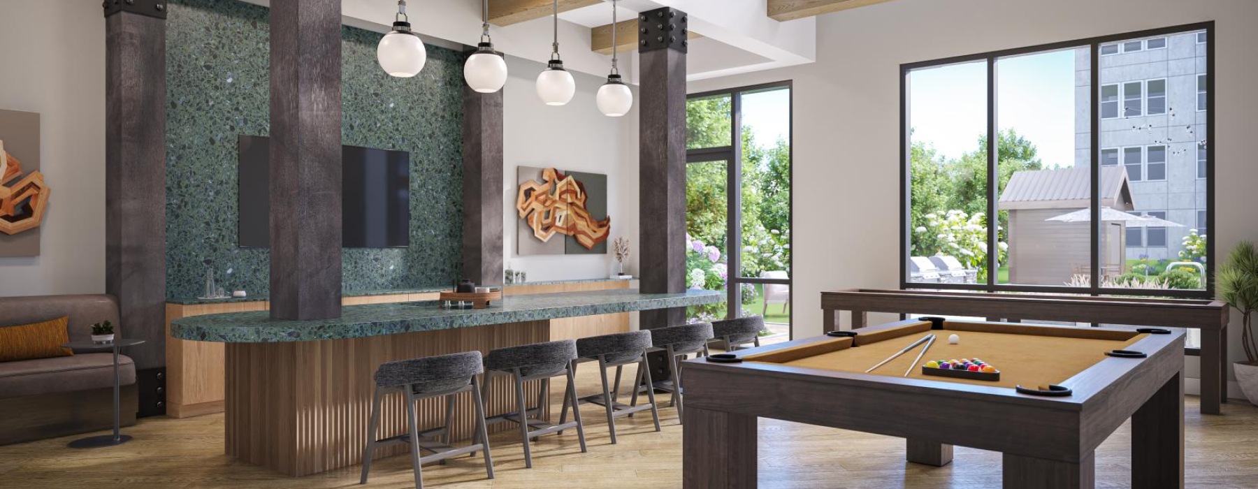 a lounge room with a pool table and chairs