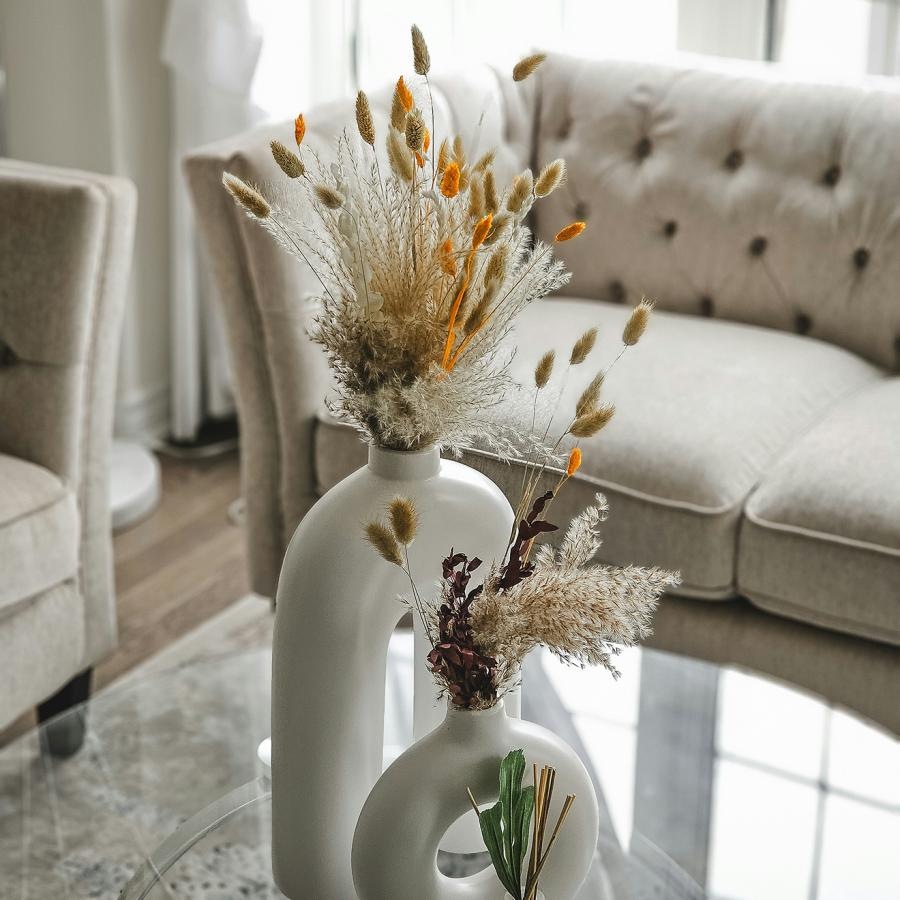 Settle into comfort at Alta Abington a vase with flowers